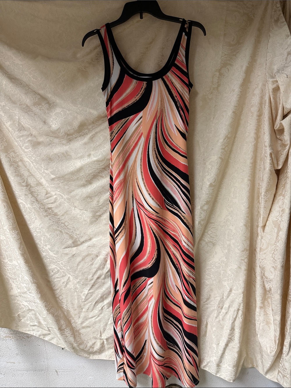 Calvin Klein Maxi Dress in coral, white, peach, and black.